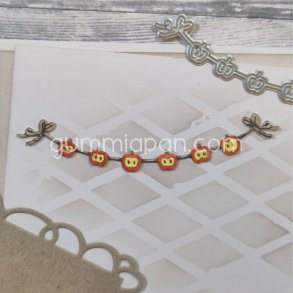 Die Girlang med &Auml;pplen gummiapan