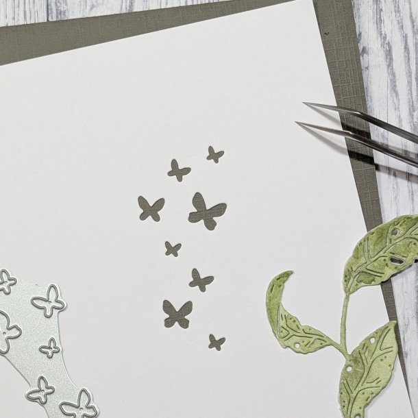 Die Textur Med Fj�rilar gummiapan FORUDBESTILLING