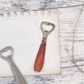 Die Kapsyl�ppnare Gummiapan 